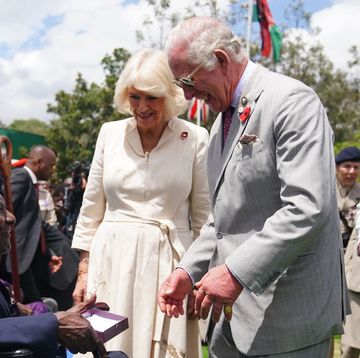 nairobi, kenya november 1 king charles iii and queen camilla meet veteran samwel nthigai mburia, who is believed to be 117 years old, during a visit to the commonwealth war graves commission cemetery in nairobi, joining british and kenyan military personnel in an act of remembrance, on day two of the state visit to kenya on november 1, 2023 in nairobi, kenya king charles iii and queen camilla are visiting kenya for four days at the invitation of kenyan president william ruto, to celebrate the relationship between the two countries the visit comes as kenya prepares to commemorate 60 years of independence photo by pool victoria jonesgetty images