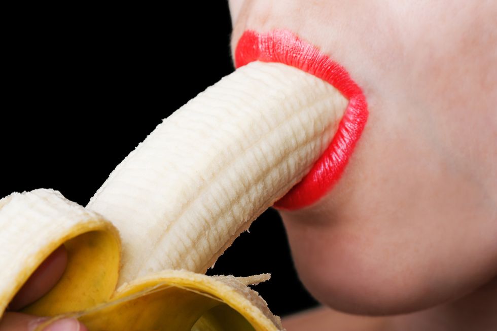Skin, Lip, Banana, Banana family, Red, Nose, Head, Mouth, Close-up, Organ, 