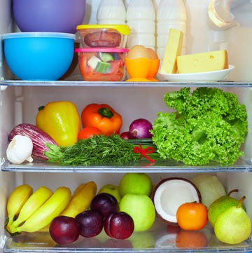 organising-your-fridge-right refrigerator full of healthy food. fruits, vegetables and dairy products