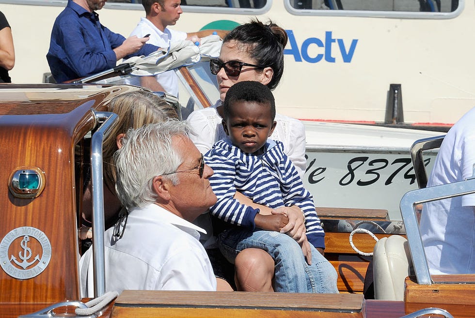 venice, italy   august 27  actress sandra bullock and son louis bardo bullock are seen during the 70th venice international film festival on august 27, 2013 in venice, italy  photo by jacopo raulefilmmagic