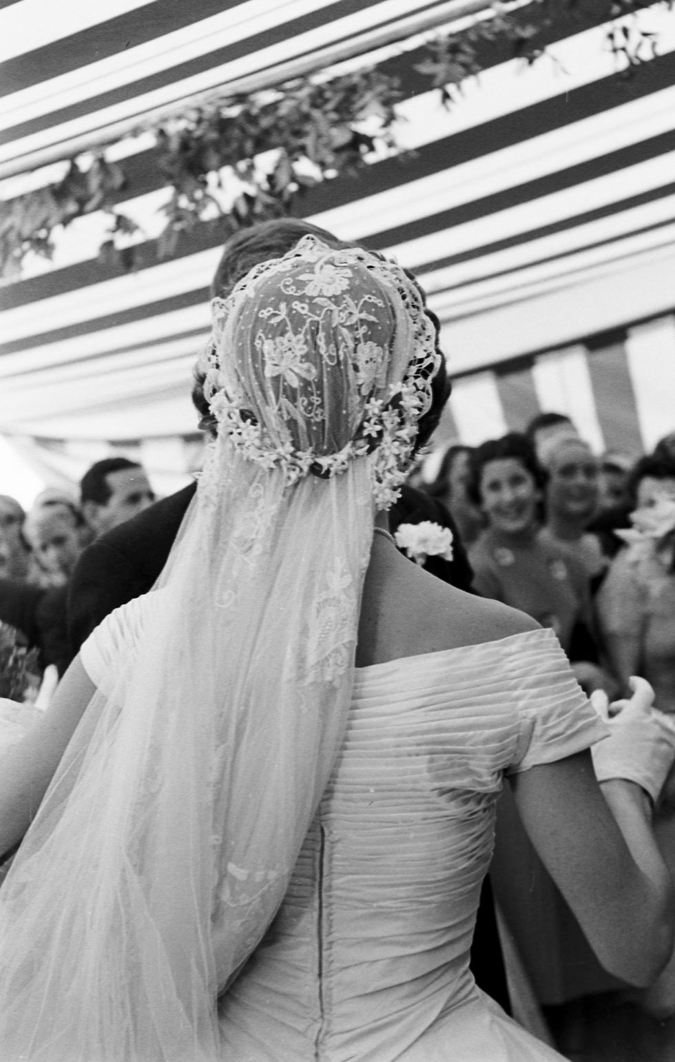 view from behind of jacqueline kennedy 1929   1994 in a battenburg wedding dress as she dances with her husband, future us president john f kennedy 1917   1963 at their wedding reception, newport, rhode island, september 12, 1953 photo by lisa larsenthe life picture collection via getty images