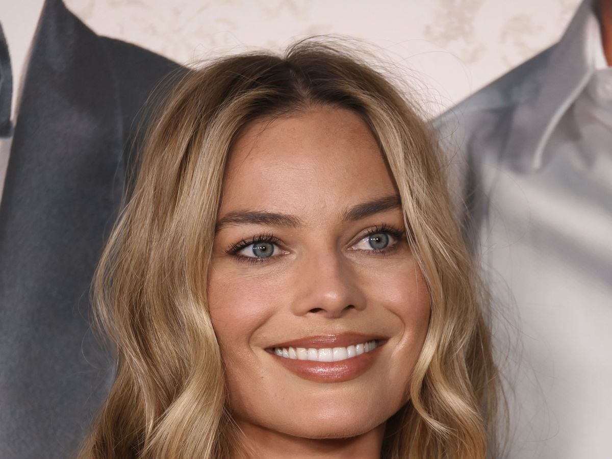Margot Robbie's 'curve haircut' layers are so glass-like