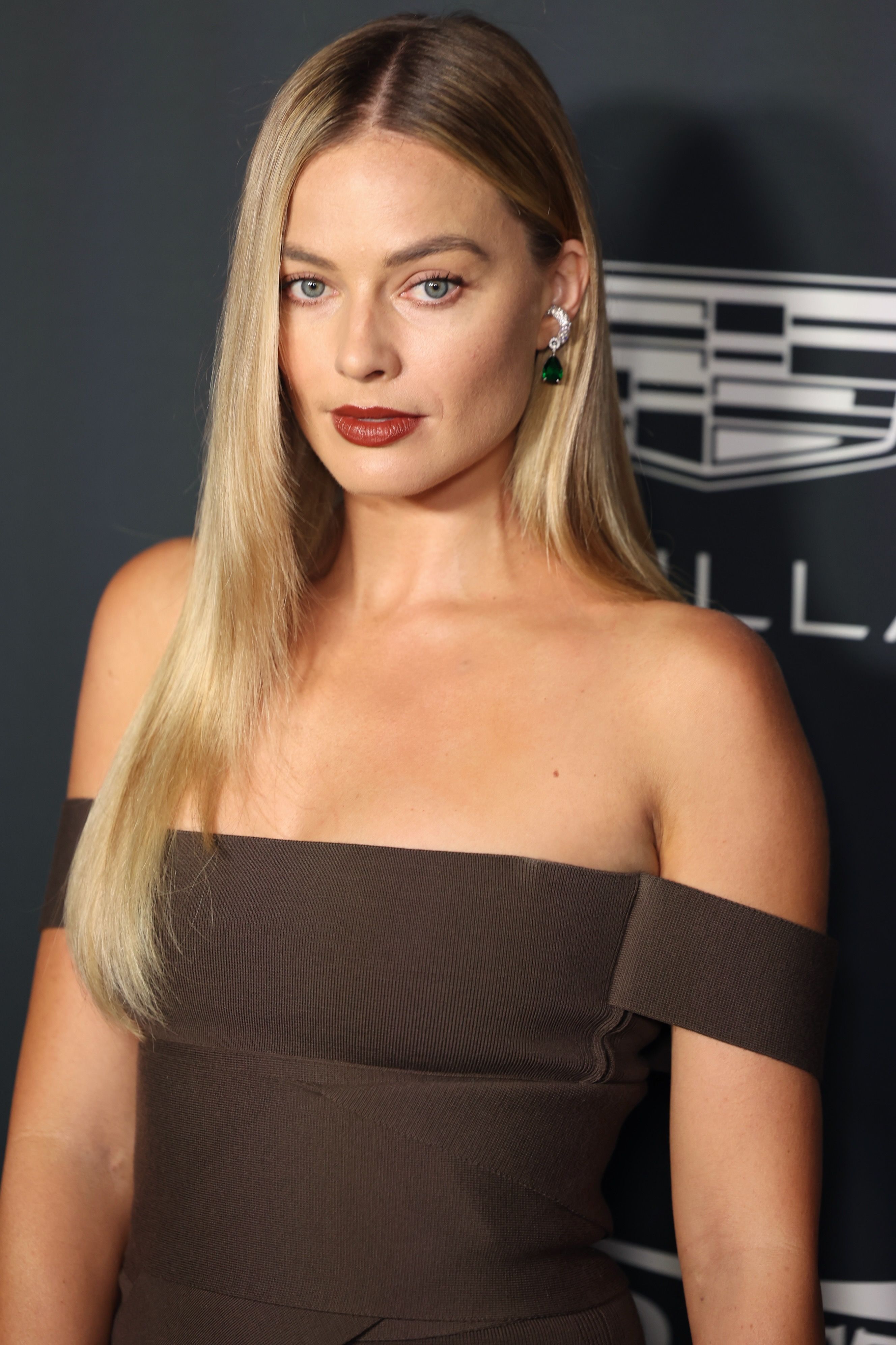 Margot Robbie's 'curve haircut' layers are so glass-like