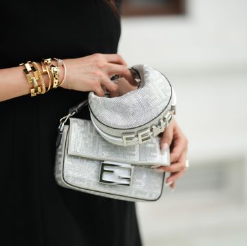 manila, philippines november 18 heart evangelista wears silver gray shiny monogram printed fendi bags, and golden bracelets from cartier, during a street style fashion photo session, on november 18, 2023 in manila, philippines photo by edward berthelotgetty images