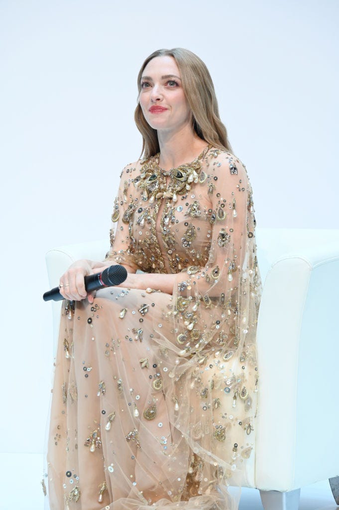 Amanda Seyfried Is Divinely Elegant in Sheer Gown Adorned with Pearls and Gold Beading