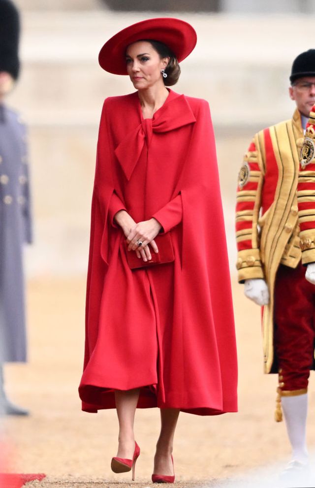 Kate Middleton Revives Royal Glamour in a Candy-Apple Red Cape Dress