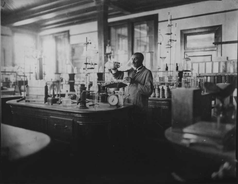 George Washington Carver working in a laboratory, 1910s