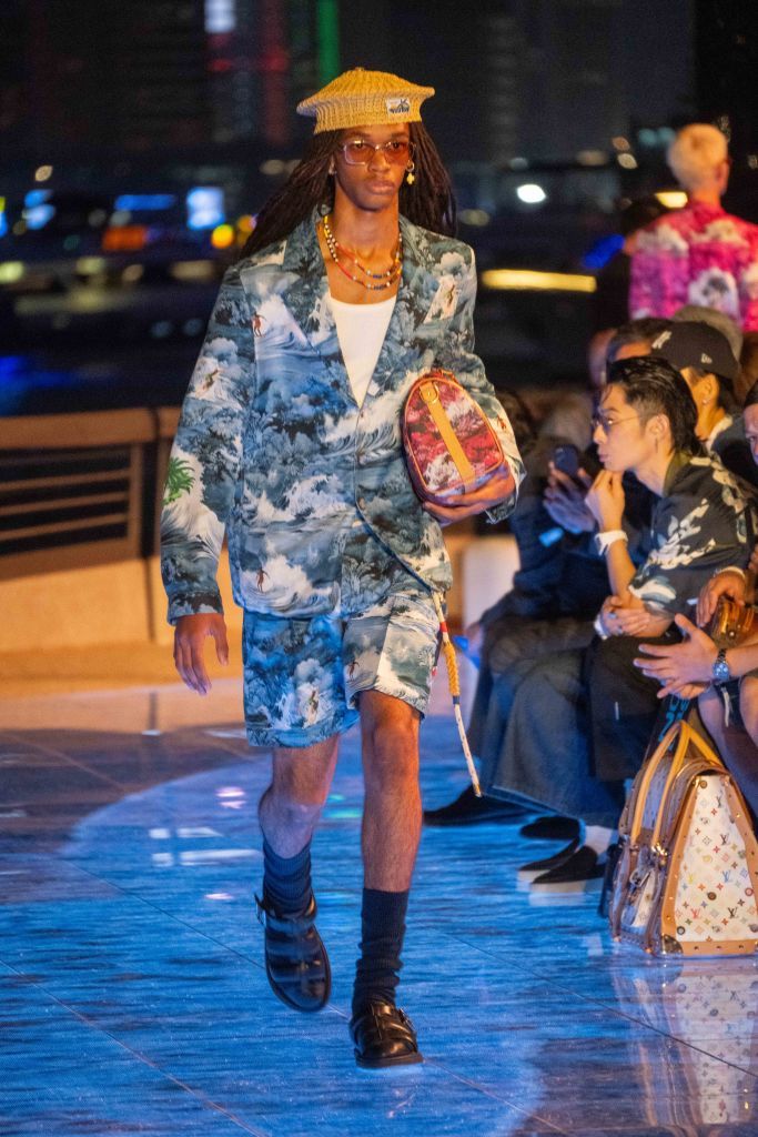 hong kong, china november 30 a model walks the runway in a design by pharrell williams during the louis vuitton mens pre fall 2024 fashion show on november 30, 2023 in hong kong, china photo by billy hc kwokgetty images
