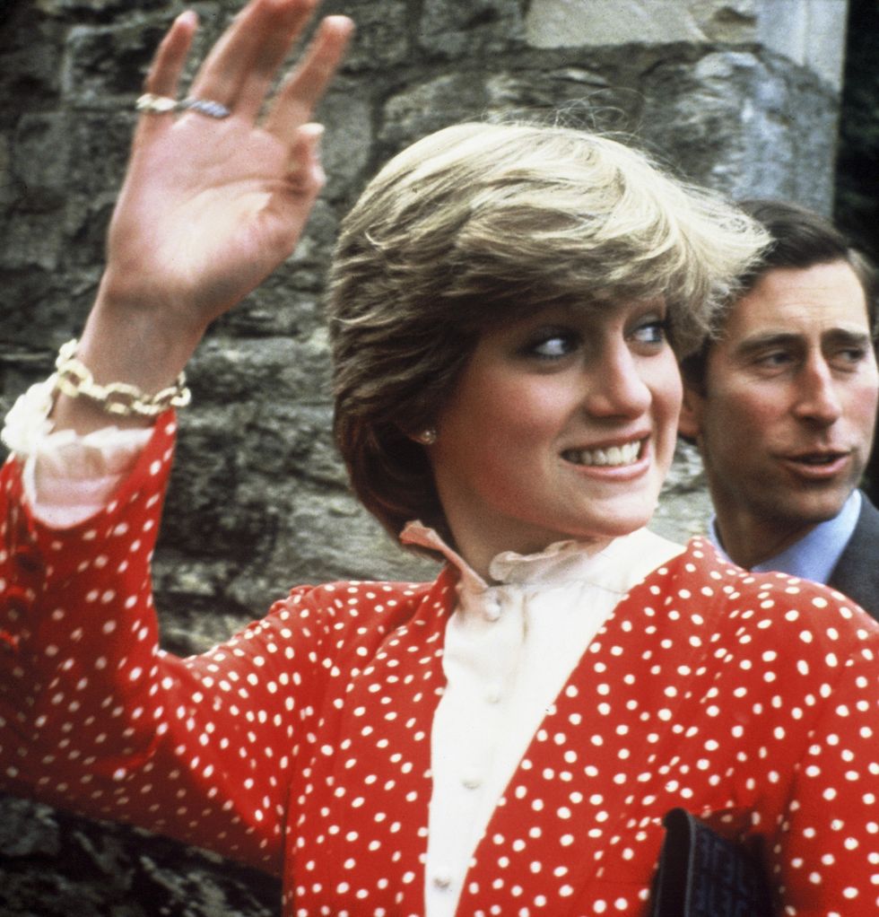 tetbury, england   may 22 lady diana spencer, wearing a red and white polka dot suit designed by jasper conran, waves as she attends her first walkabout with her fiance prince charles, prince of wales, two months before their wedding, on may 22, 1981 in tetbury, gloucestshire, united kingdom photo by anwar husseingetty images