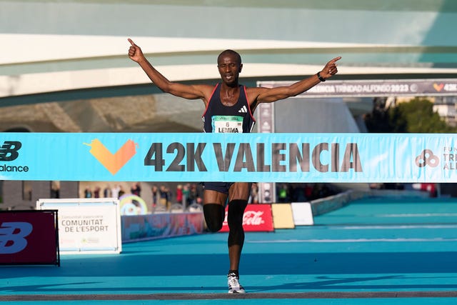 valencia, spain december 03 sisay lemma of kenya arrives to the finish line for win the 2023 valencia marathon trinidad alfonso on december 03, 2023 in valencia, spain photo by aitor alcaldegetty images for adidas