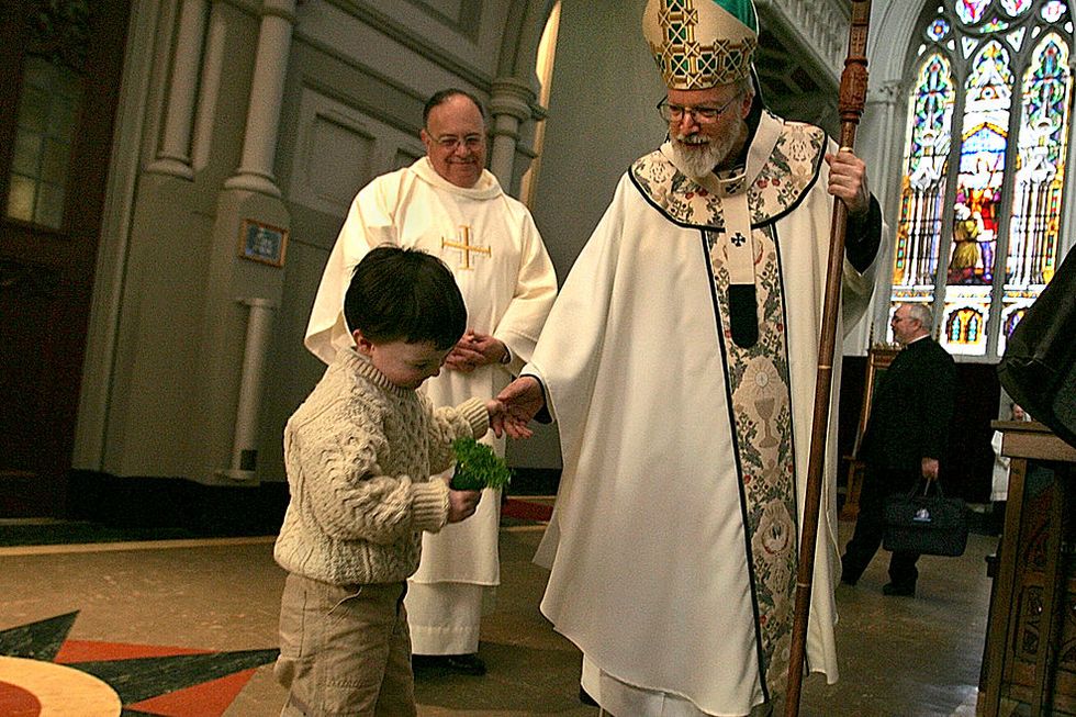 boston   march 17 at the cathedral of the holy cross, aidan dowling, 3, of roslindale, greeted archbishop sean patrick omalley after the st patricks day mass photo by suzanne kreiterthe boston globe via getty images