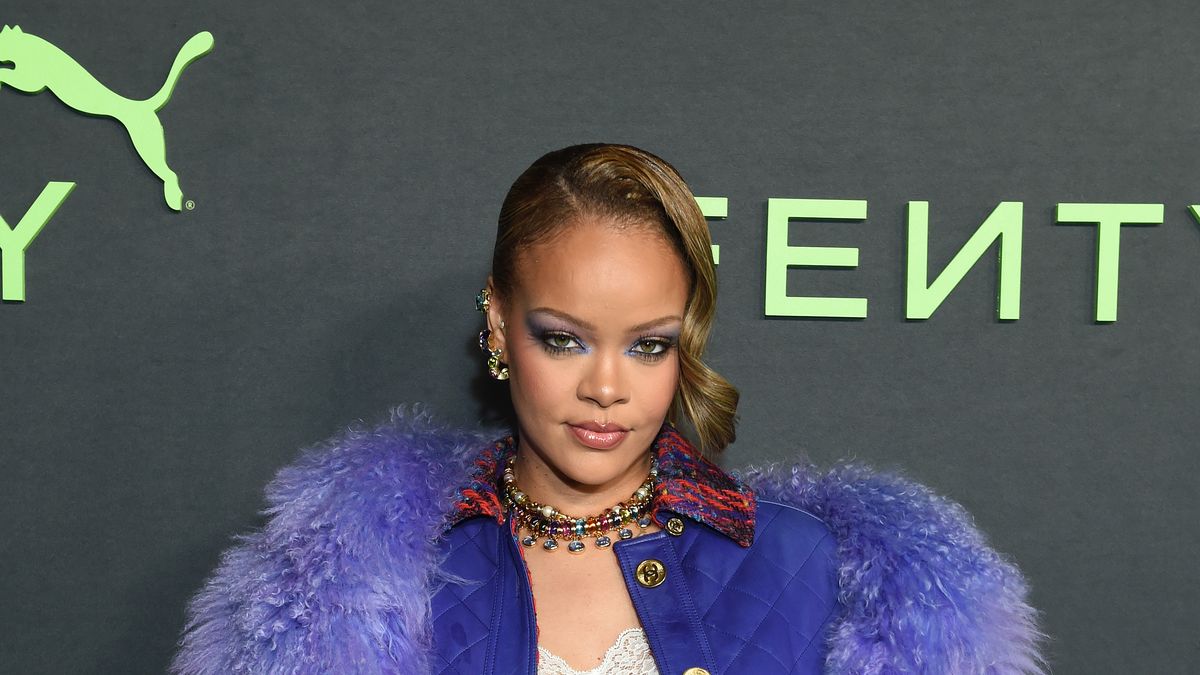 Rihanna Returns to the Carpet in a Purple Fur Coat and Matching Sneakers