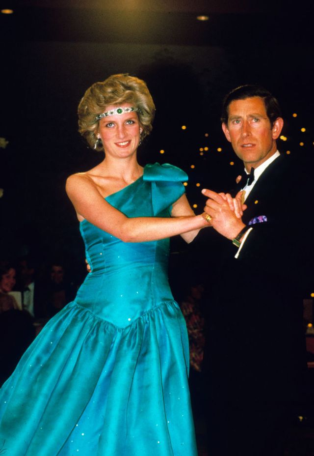 melbourne, australia   october 31 prince charles, prince of wales and diana, princess of wales, wearing a green satin evening dress designed by david and elizabeth emanuel and an emerald necklace as a headband, dance together during a gala dinner dance at the southern cross hotel on october 31, 1985 in melbourne, australia photo by anwar husseingetty images