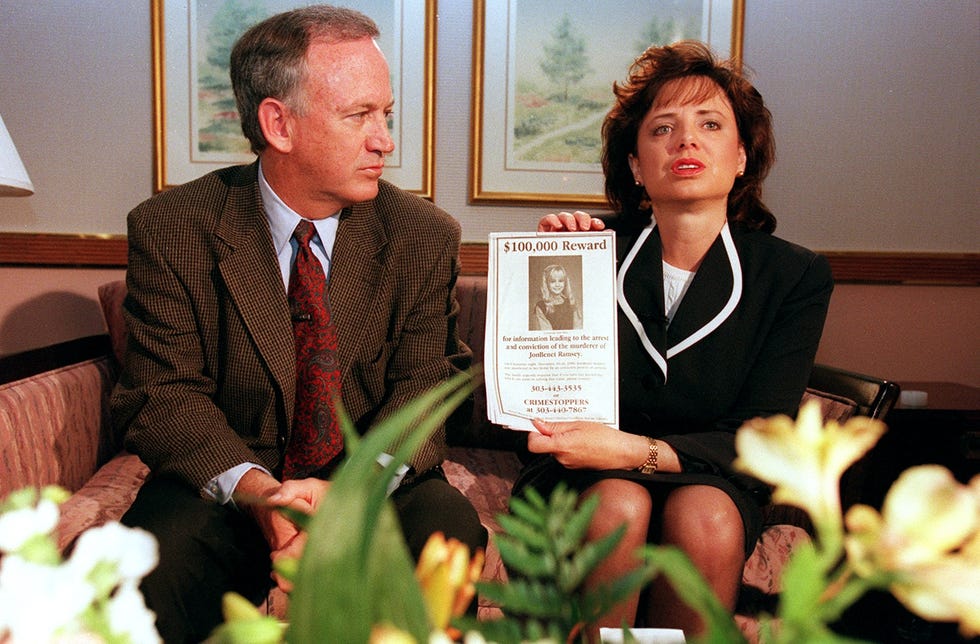 Boulder, Colorado May 1 John and Patsy Ramsey, parents of Jonbenet Ramsey, meet with a small select group of local Colorado media after four months of silence in Boulder, Colorado May 1, 1997 Patsy holds a reward sign for information leading to the arrest of their daughters murderer of their 6 -year-old daughter was found dead on Christmas night 1996. photo: Helen H Richardson, Denver Post