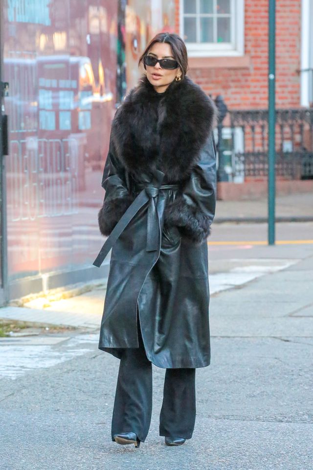 Emily Ratajkowski Is Festive in a Sleek Leather Fur-Lined Trench
