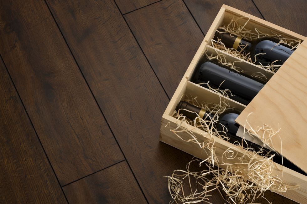 box of wine on wooden floor