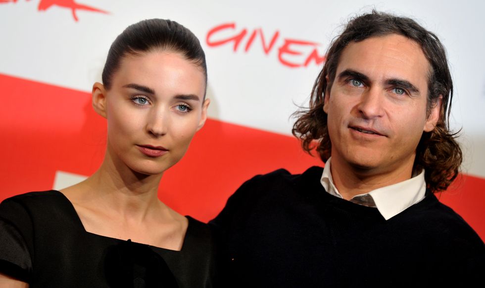 us actor joaquin phoenix poses with us actress rooney mara during the photocall of the fim heron november 10, 2013 at the rome international film festival afp photo  tiziana fabi        photo credit should read tiziana fabiafp via getty images