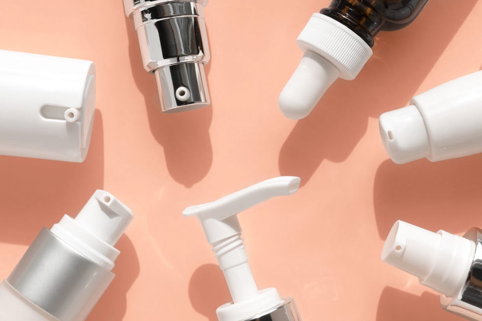 skincare bottle tops framed around picture in natural sunlight
