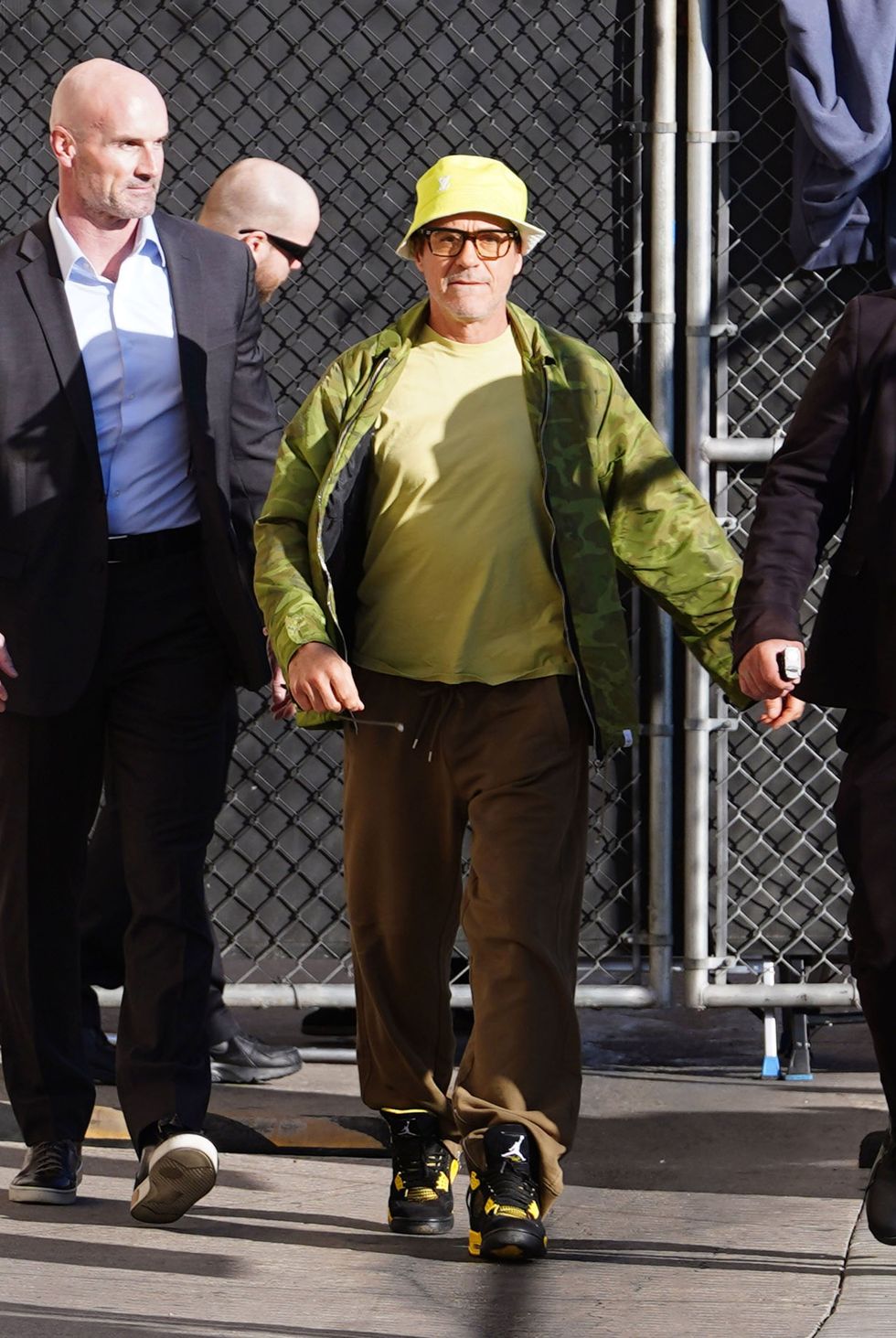 a person in a green jacket