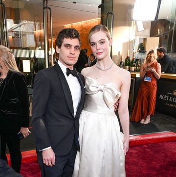 beverly hills, california january 07 l r gus wenner and elle fanning at the 81st annual golden globe awards with moet chandon, celebrating the 13th year of toast for a cause at the beverly hilton on january 7, 2023 photo by michael kovacgetty images for moet chandon