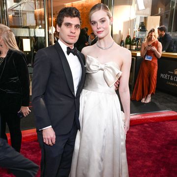 beverly hills, california january 07 l r gus wenner and elle fanning at the 81st annual golden globe awards with moet chandon, celebrating the 13th year of toast for a cause at the beverly hilton on january 7, 2023 photo by michael kovacgetty images for moet chandon