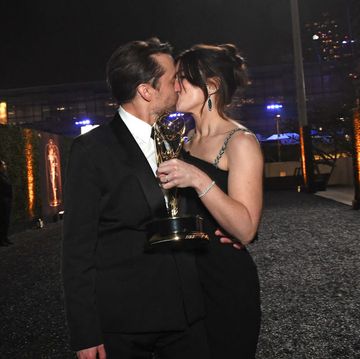 us actor kieran culkin, with his award for outstanding lead actor in a drama series for succession, kisses wife jazz charton as they attend the 75th emmy awards governors gala at the los angeles convention center in los angeles on january 15, 2024 photo by valerie macon afp photo by valerie maconafp via getty images