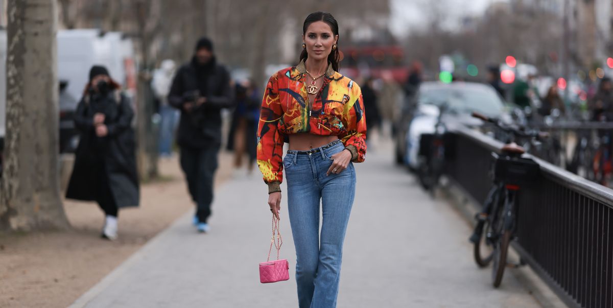 a guest attends paris fashion week, 2024 in bootcut jeans