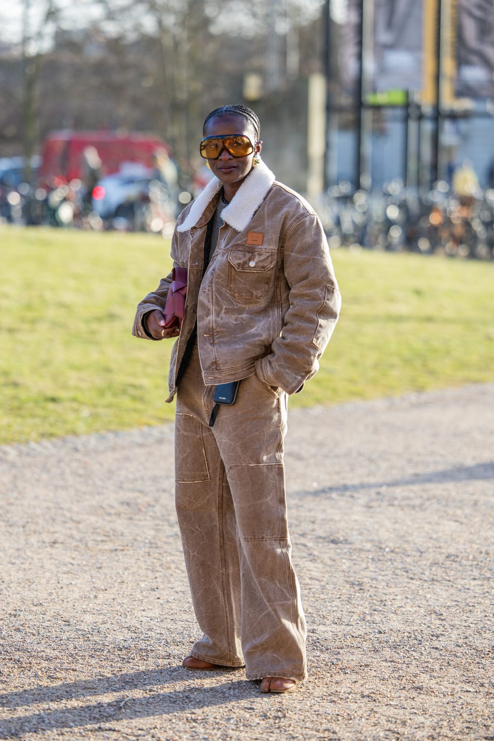 copenhagen, denmark february 01 a guest wears brown shearling jacket outside marimekko during the copenhagen fashion week aw24 on february 01, 2024 in copenhagen, denmark photo by christian vieriggetty images