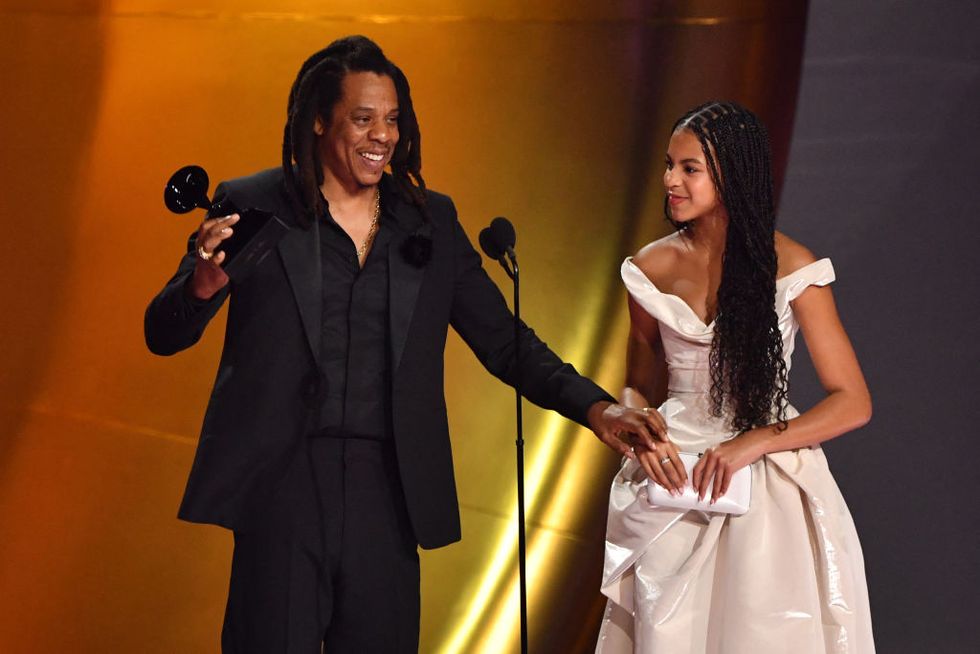 us rapper jay z l accepts the dr dre global impact award alongside his daughter blue ivy on stage during the 66th annual grammy awards at the cryptocom arena in los angeles on february 4, 2024 photo by valerie macon afp photo by valerie maconafp via getty images
