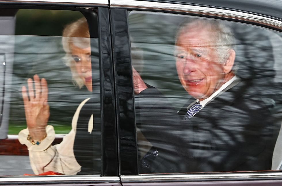 topshot britains king charles iii and britains queen camilla wave as they leave by car from clarence house in london on february 6, 2024 king charles iiis estranged son prince harry reportedly arrived in london on tuesday after his fathers diagnosis of cancer, which doctors caught early photo by henry nicholls afp photo by henry nichollsafp via getty images