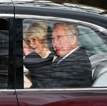 britains king charles iii and britains queen camilla wave as they leave by car from clarence house, travelling to buckingham palace, in london on february 6, 2024 king charles iiis estranged son prince harry reportedly arrived in london on tuesday after his fathers diagnosis of cancer, which doctors caught early photo by henry nicholls afp photo by henry nichollsafp via getty images