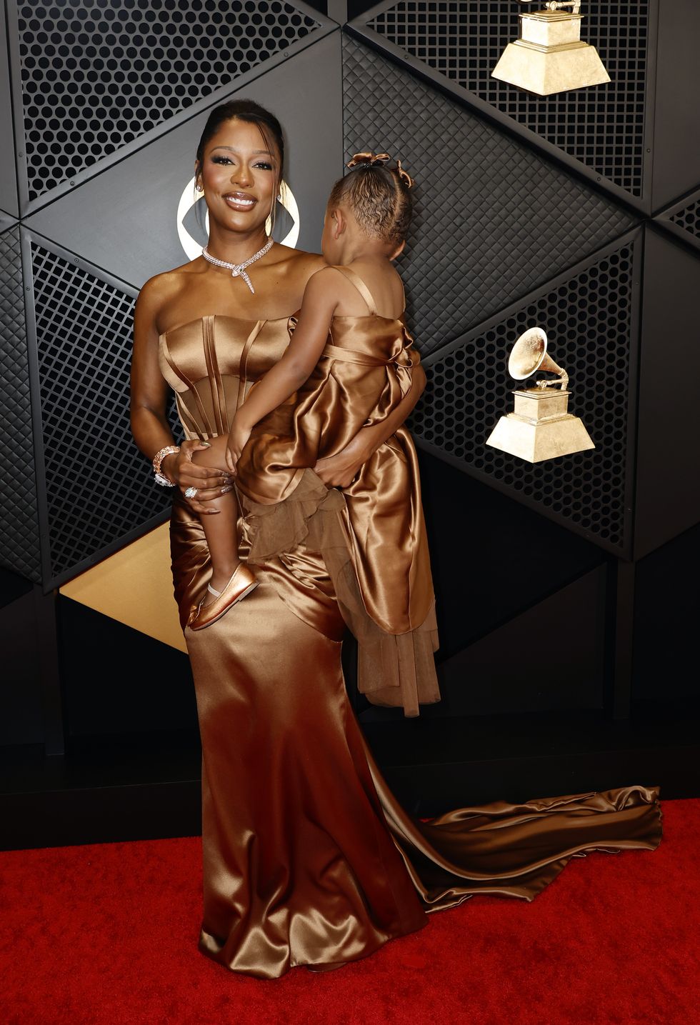 Victoria Monét and Daughter Hazel Match in Bronze Dresses at the 2024  Grammys