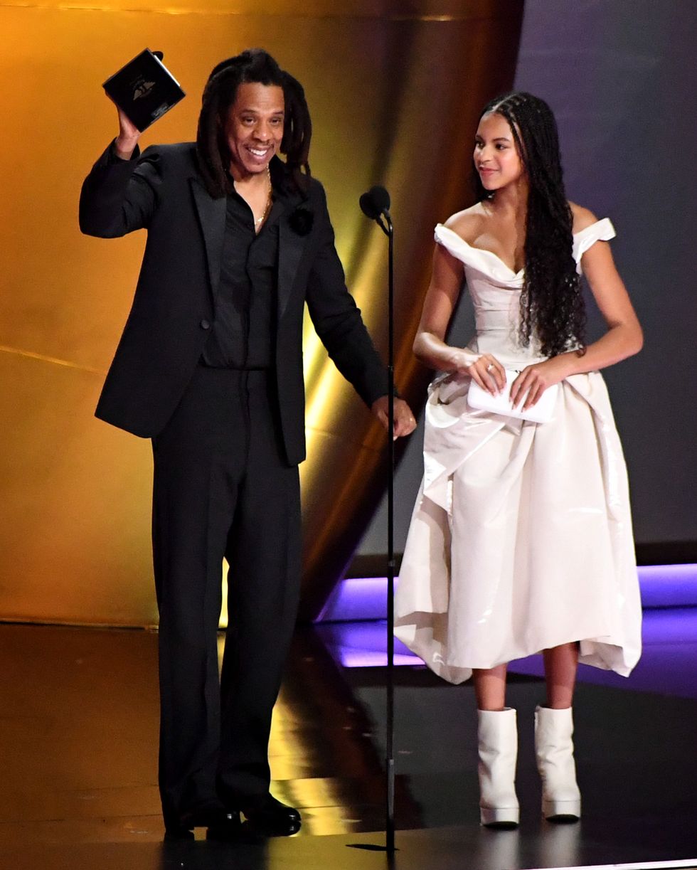 los angeles, california february 04 for editorial use only jay z and blue ivy carter accept the dr dre global impact award award onstage during the 66th grammy awards at cryptocom arena on february 04, 2024 in los angeles, california photo by jc oliverawireimage