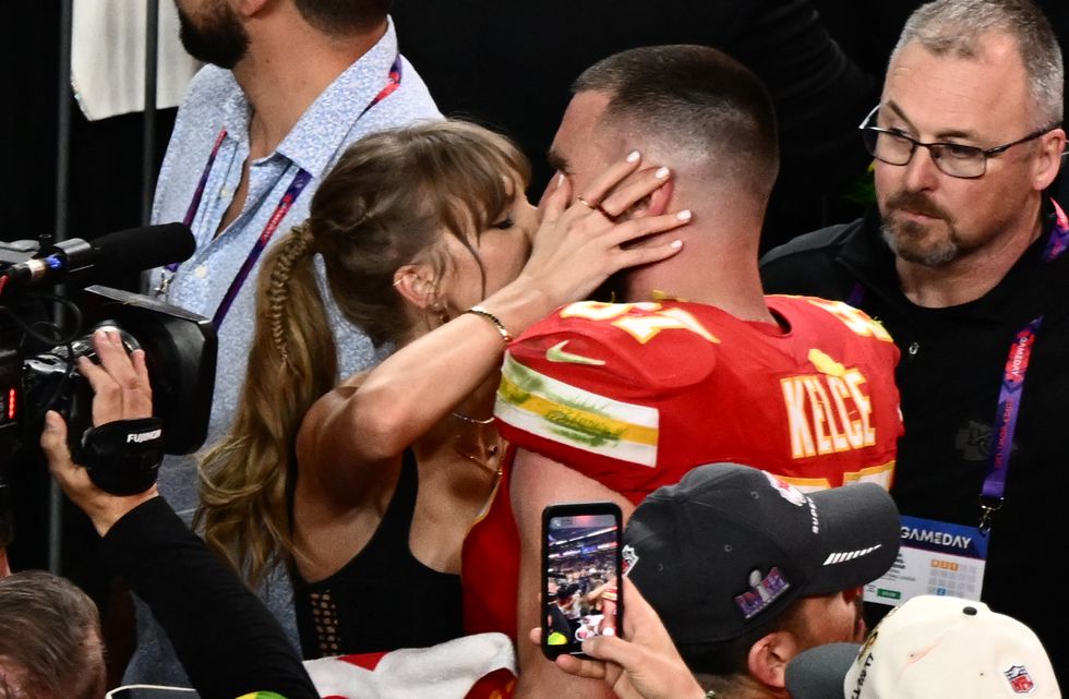 us singer songwriter taylor swift kisses kansas city chiefs tight end 87 travis kelce after the chiefs won super bowl lviii against the san francisco 49ers at allegiant stadium in las vegas, nevada, february 11, 2024 photo by patrick t fallon afp photo by patrick t fallonafp via getty images