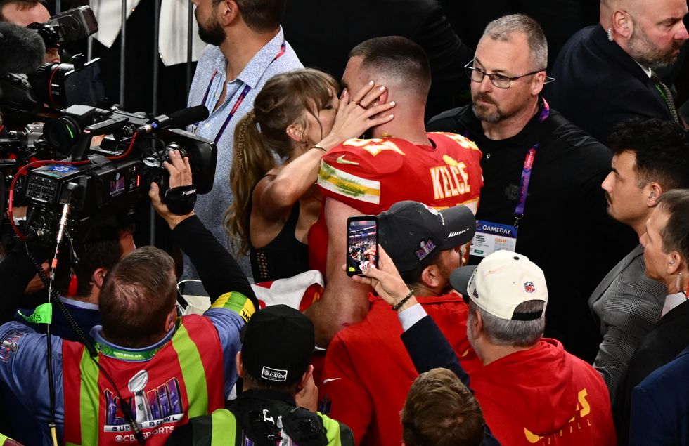 us singer songwriter taylor swift kisses kansas city chiefs tight end 87 travis kelce after the chiefs won super bowl lviii against the san francisco 49ers at allegiant stadium in las vegas, nevada, february 11, 2024 photo by patrick t fallon afp photo by patrick t fallonafp via getty images