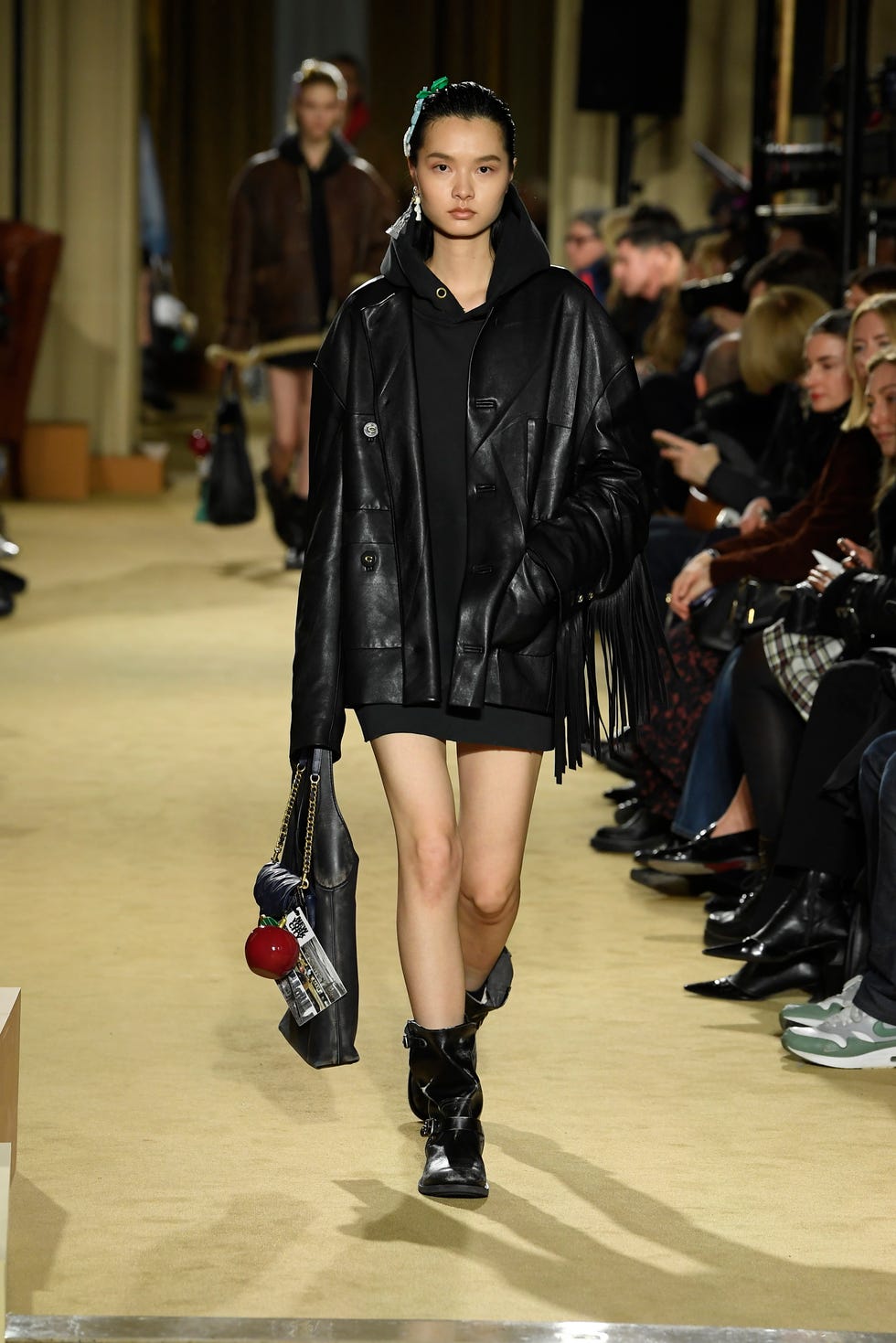 model on the runway at coach rtw fall 2024 as part of new york ready to wear fashion week held at the james b duke house on february 12, 2024 in new york, new york photo by giovanni giannoniwwd via getty images