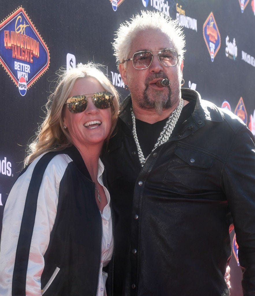 las vegas, nevada february 11 lori fieri l and guy fieri arrive at guy fieris flavortown tailgate on february 11, 2024 in las vegas, nevada photo by mindy smallgetty images