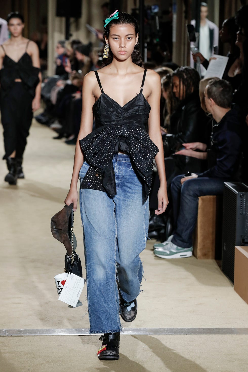 new york, usa february 12 a model walks the runway during the coach ready to wear fallwinter 2024 2024 fashion show as part of the new york fashion week on february 12, 2024 in new york photo by victor virgilegamma rapho via getty images