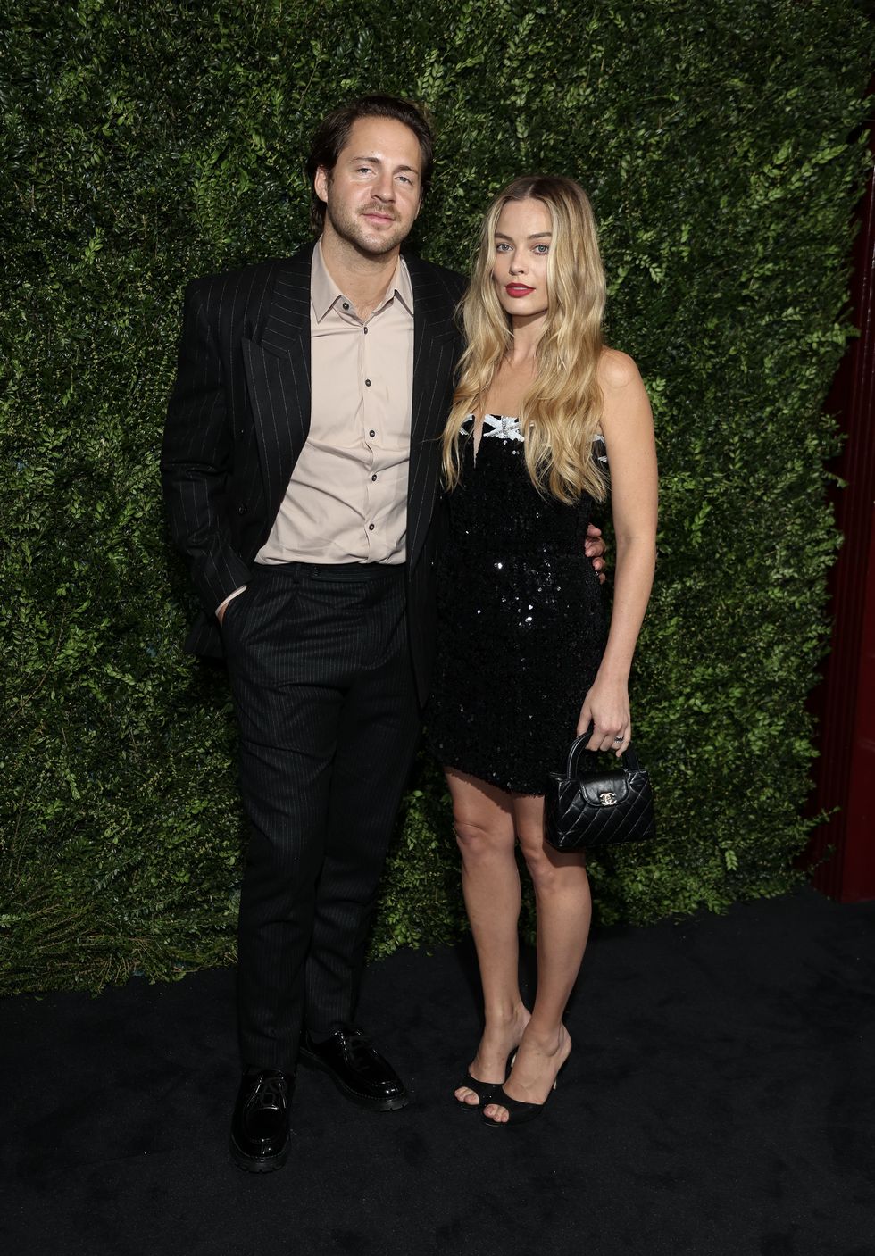 london, england february 17 tom ackerley and margot robbie attend the charles finch chanel 2024 pre bafta party on february 17, 2024 in london, england photo by mike marslandwireimage