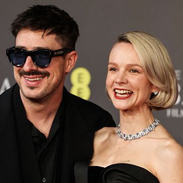 british actress carey mulligan r poses with her husband us singer and musician marcus mumford poses on the red carpet upon arrival at the bafta british academy film awards at the royal festival hall, southbank centre, in london, on february 18, 2024 photo by adrian dennis afp photo by adrian dennisafp via getty images