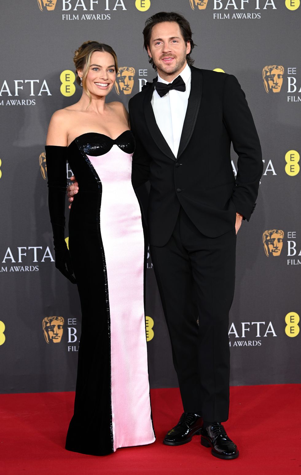 london, england february 18 margot robbie and tom ackerley attend the ee bafta film awards 2024 at the royal festival hall on february 18, 2024 in london, england photo by joe maherbaftagetty images for bafta