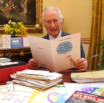 london, england february 21 in this photo released on february 23, king charles iii reads cards and messages, sent by well wishers following his cancer diagnosis, in the 18th century room of the belgian suite at buckingham palace on february 21, 2024 in london, england following the announcement of the kings cancer diagnosis, the correspondence team at buckingham palace have received more than 7,000 letters and cards form across the world the king has been sent a selection in his daily red box of paperwork photo by jonathan brady poolgetty images