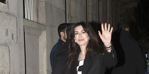 milan, italy february 23 anne hathaway is seen leaving versaces party on february 23, 2024 in milan, italy photo by megagc images
