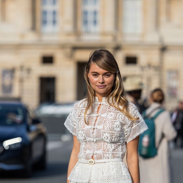 paris, france february 27 claire rose cliteur wears white laced skirt, top, bag outside dior during the womenswear fallwinter 20242025 as part of paris fashion week on february 27, 2024 in paris, france photo by christian vieriggetty images