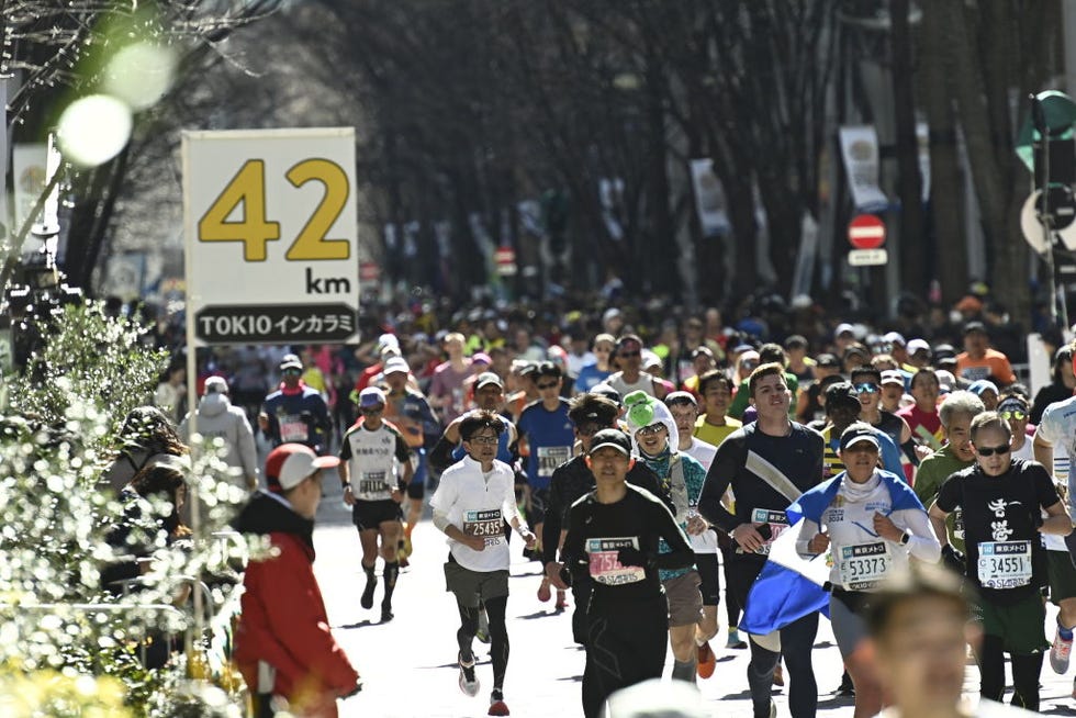 tokyo, japan march 3 runners are seen crossing the tokyo marunouchi district as they compete during the tokyo marathon on march 3, 2024, in tokyo, japan photo by david mareuilanadolu via getty images