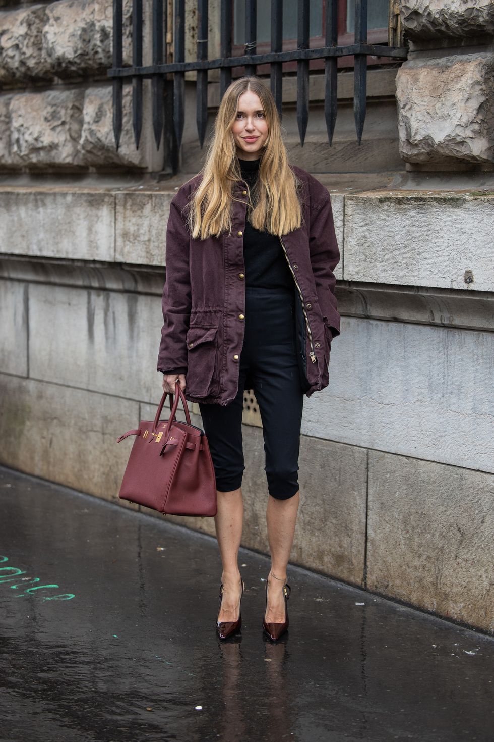 paris, france march 02 pernille teisbaek wears red bag, jacket, black cropped pants, shirt, heels outside hermes during the womenswear fallwinter 20242025 as part of paris fashion week on march 02, 2024 in paris, france photo by christian vieriggetty images