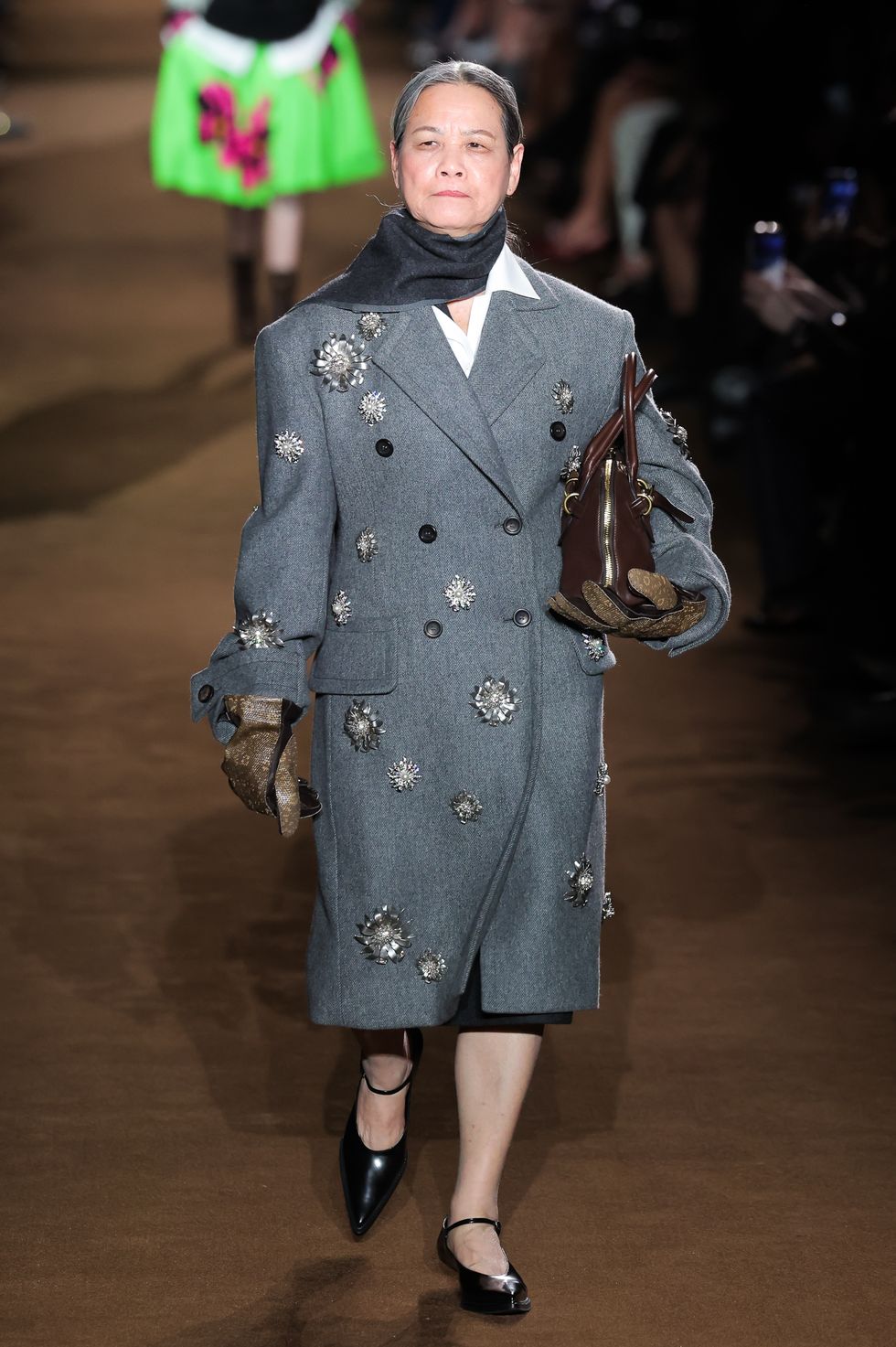 paris, france march 05 editorial use only for non editorial use please seek approval from fashion house qin huilan walks the runway during the miu miu womenswear fallwinter 2024 2025 show as part of paris fashion week on march 05, 2024 in paris, france photo by victor boykogetty images