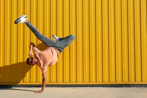 a person doing a handstand