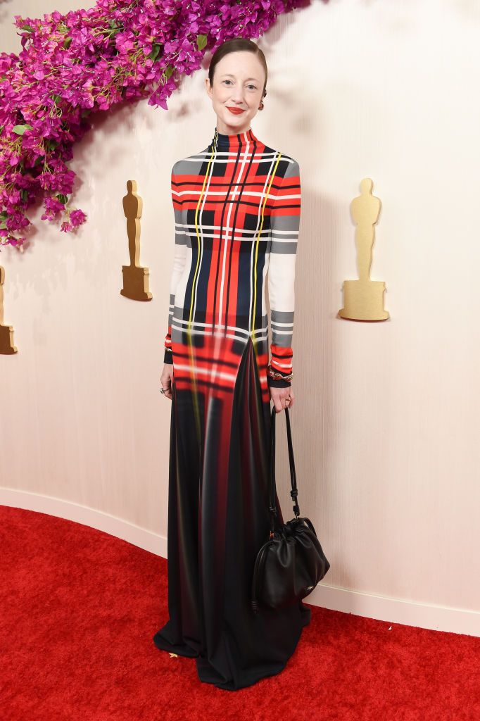 andrea riseborough wearing plaid dress on the oscars red carpet 2024