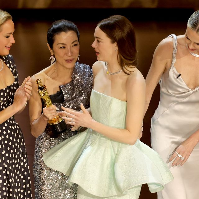 hollywood, california march 10 emma stone 2nd r accepts the best actress in a leading role award for poor things from jennifer lawrence, michelle yeoh, and charlize theron onstage during the 96th annual academy awards at dolby theatre on march 10, 2024 in hollywood, california photo by kevin wintergetty images